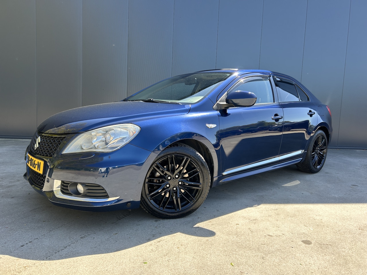 Suzuki Kizashi - 2.4 AUTOMAAT AWD Sport OPEN DAK LEER MEMORY STOEL CAMERA NAVI CRUISE ECC LMV - AutoWereld.nl