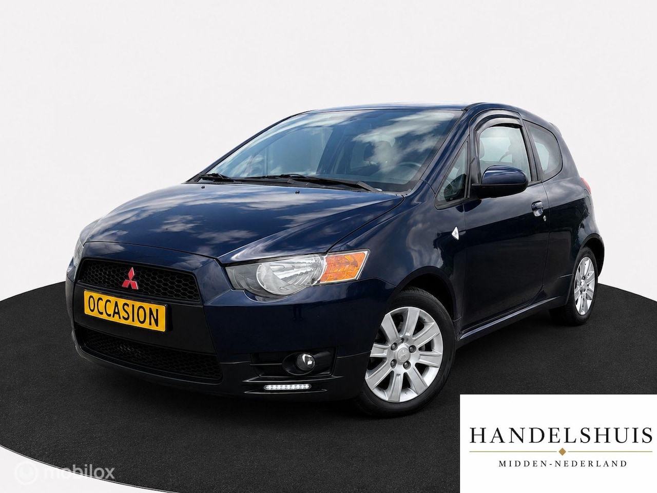 Mitsubishi Colt - 1.3 AircoNaviParksensorStoelverwarmdVelgen - AutoWereld.nl