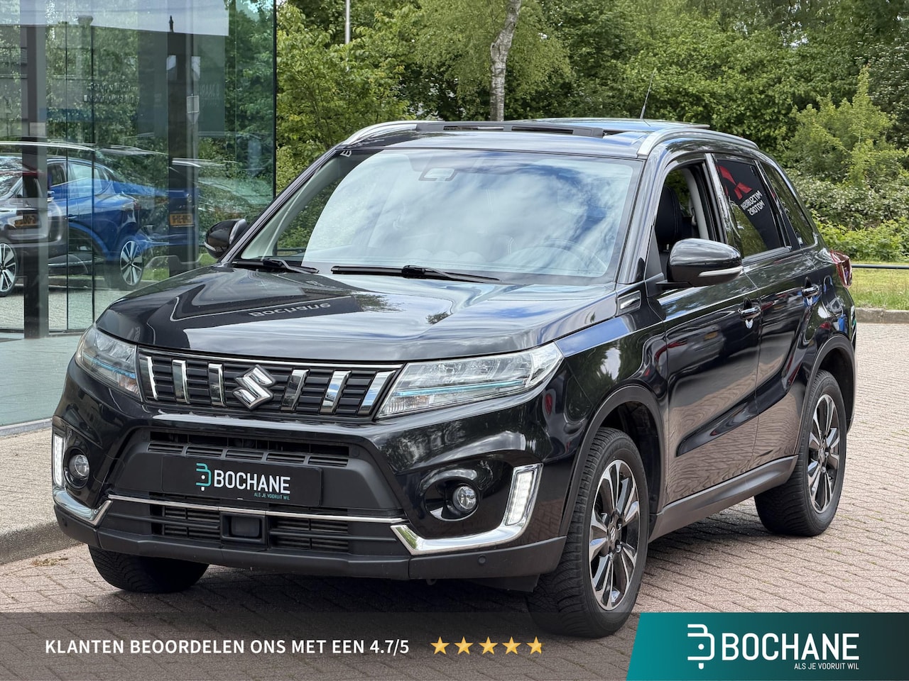 Suzuki Vitara - 1.4 Boosterjet Style Smart Hybrid 129PK | Panoramadak | Half-leder | Navigatie | Climate C - AutoWereld.nl