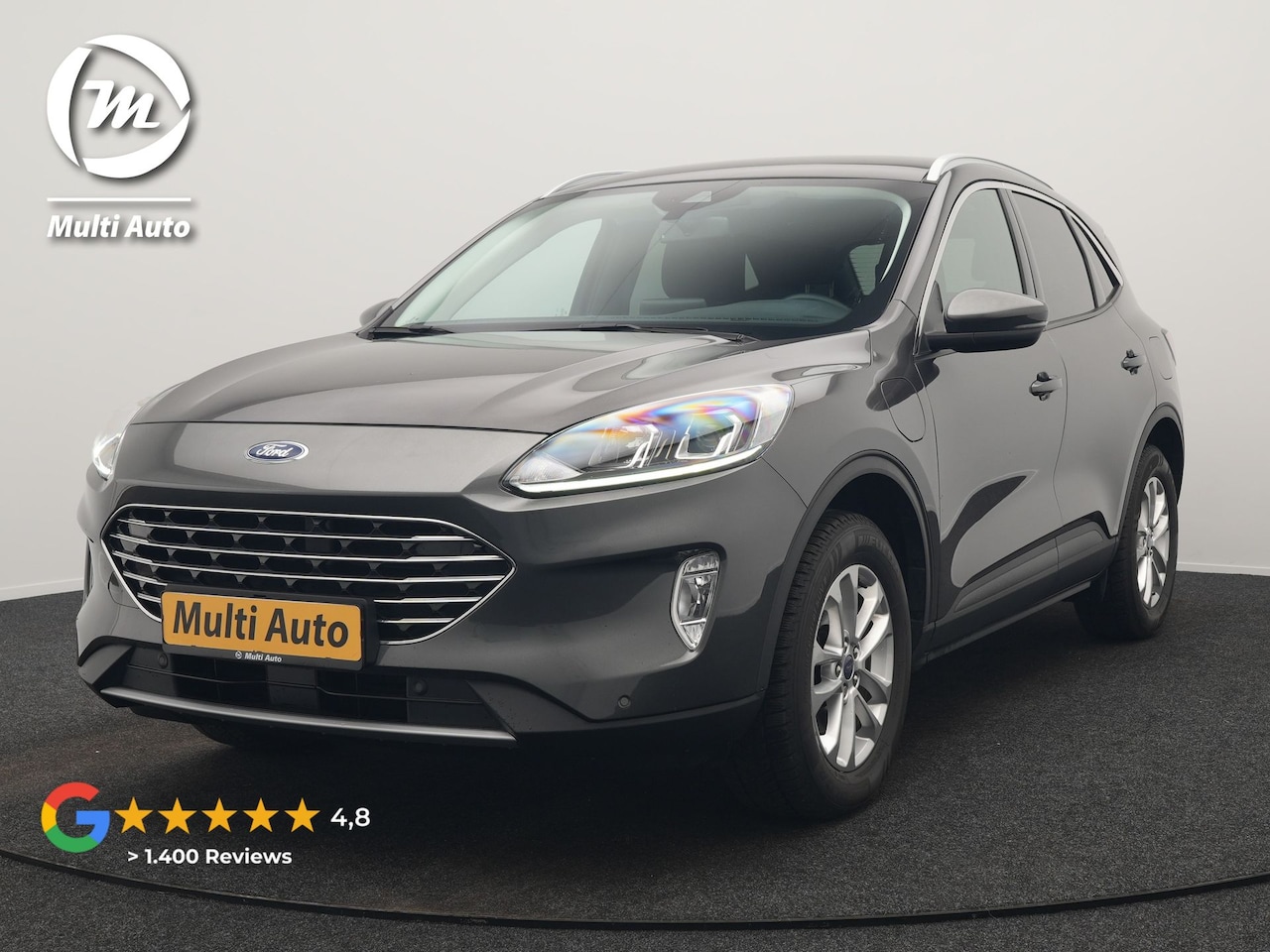 Ford Kuga - 2.5 Titanium PHEV 225pk Dealer O.H | Camera | Keyless | Cruise Control | Sportstoelen & St - AutoWereld.nl