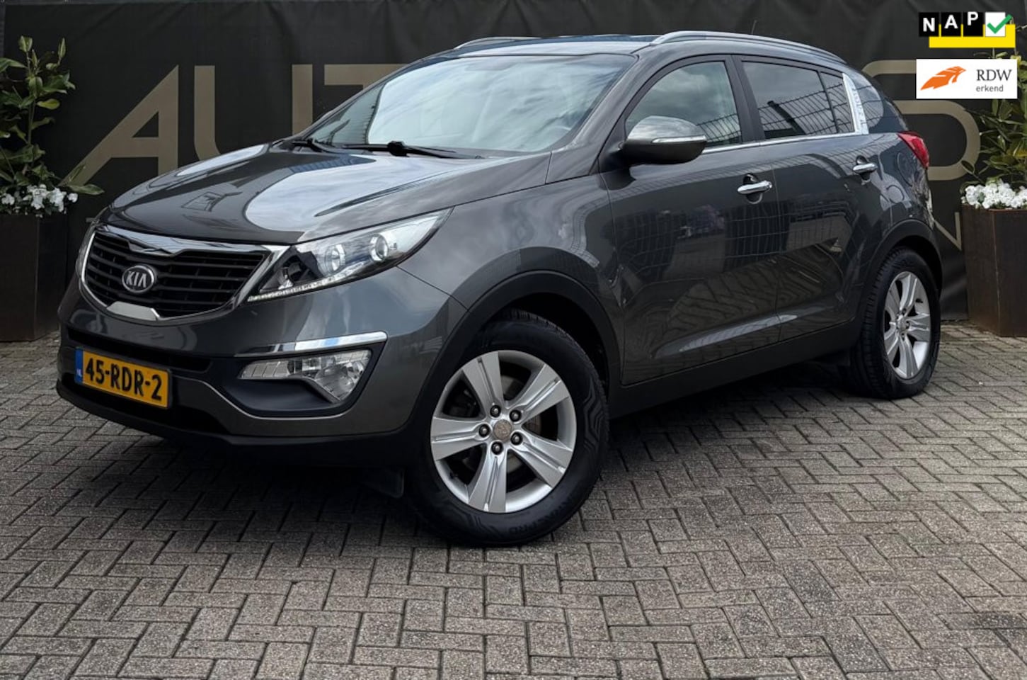 Kia Sportage - 1.6 GDI X-ecutive Plus Pack*Trekhaak*Parkeersens.*Cruisecontr.* - AutoWereld.nl