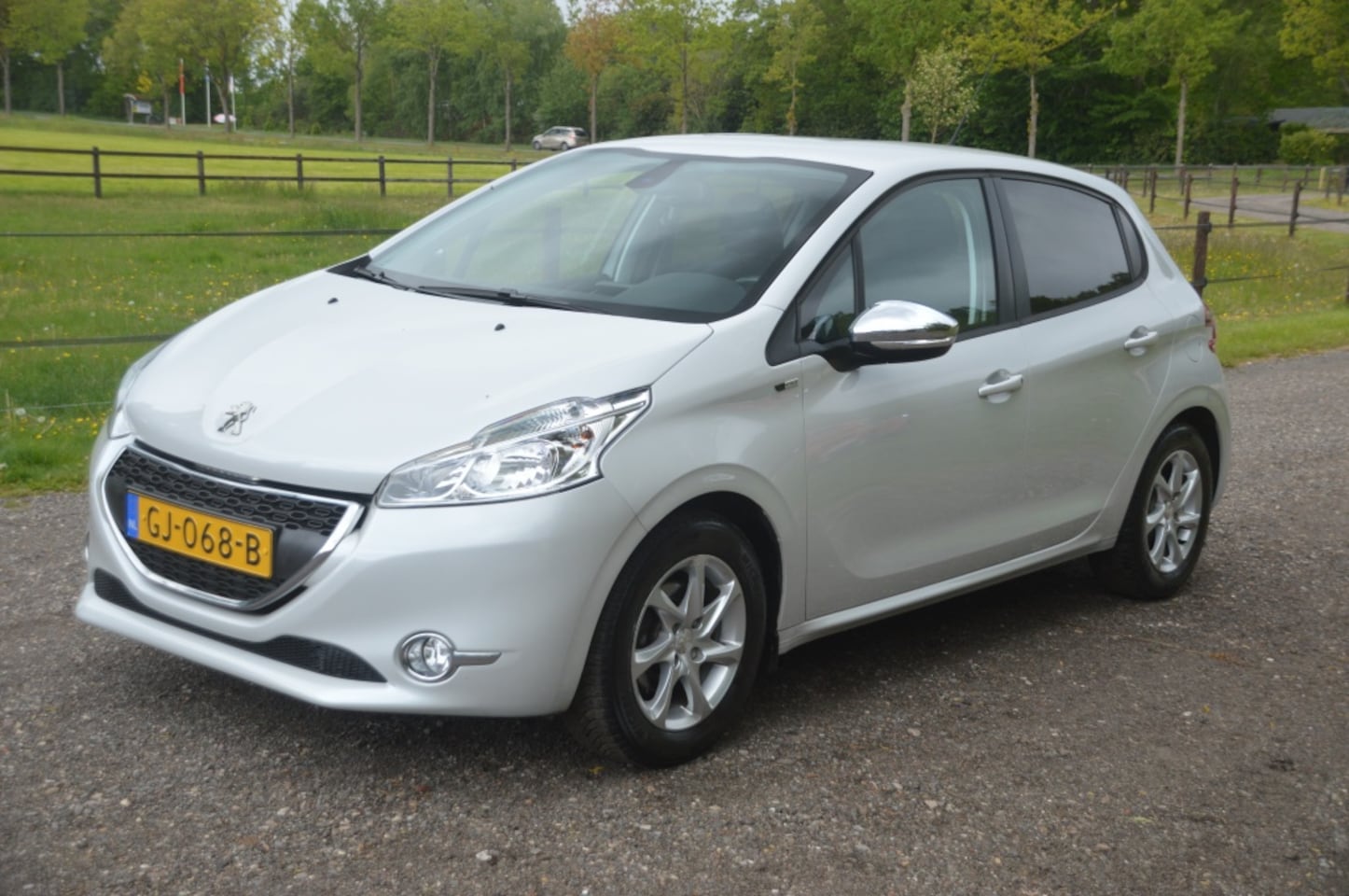 Peugeot 208 - 1.2 PT Style Pack Clima Cruise PDC Navi - AutoWereld.nl