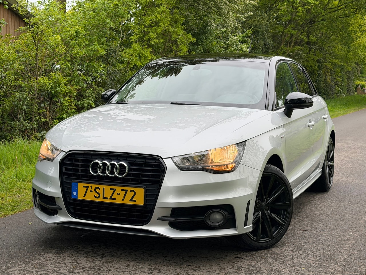 Audi A1 Sportback - 1.2 TFSI Admired | S-Line + Navi + Cruise + Airco Nu € 9.975,-!!! - AutoWereld.nl