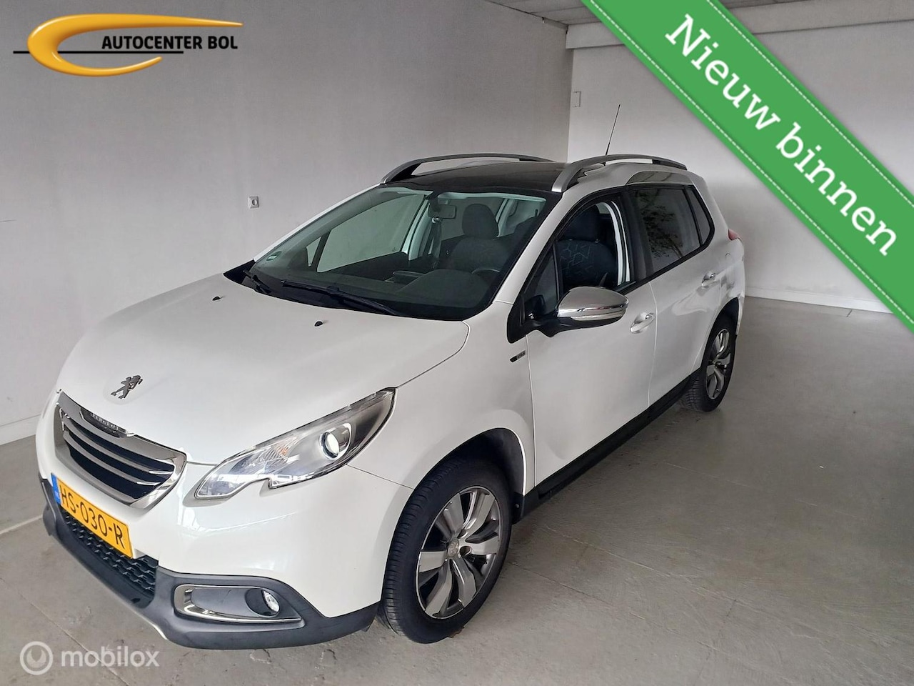 Peugeot 2008 - 1.2 Style - AutoWereld.nl