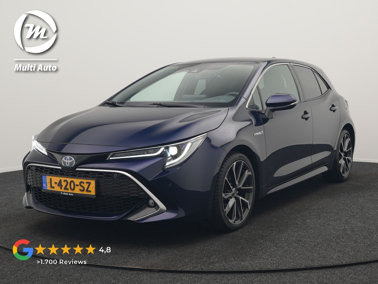 Toyota Corolla - 2.0 Hybrid Executive 184pk Dealer O.H | Adaptive Cruise | Head Up | Camera | Sportstoelen - AutoWereld.nl