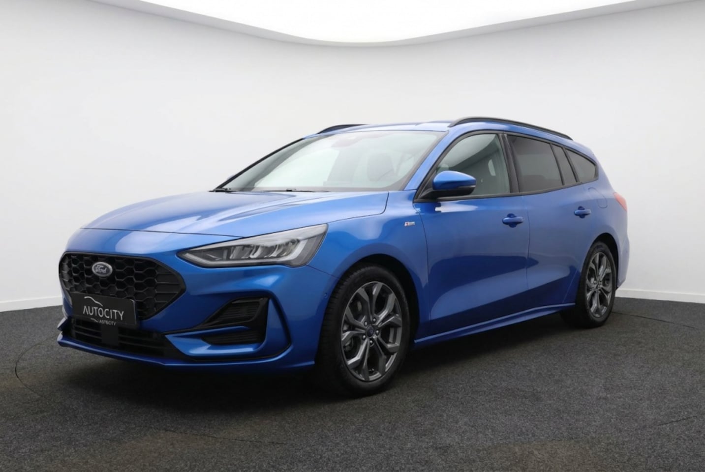 Ford Focus Wagon - ST-Line 1.0 Ecoboost Hybrid ST Line Automaat l Camera l Keyless - AutoWereld.nl