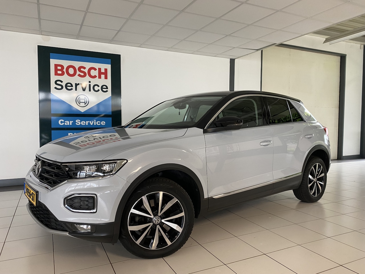 Volkswagen T-Roc - 1.5 TSI Sport Carplay / Navigatie / Camera - AutoWereld.nl