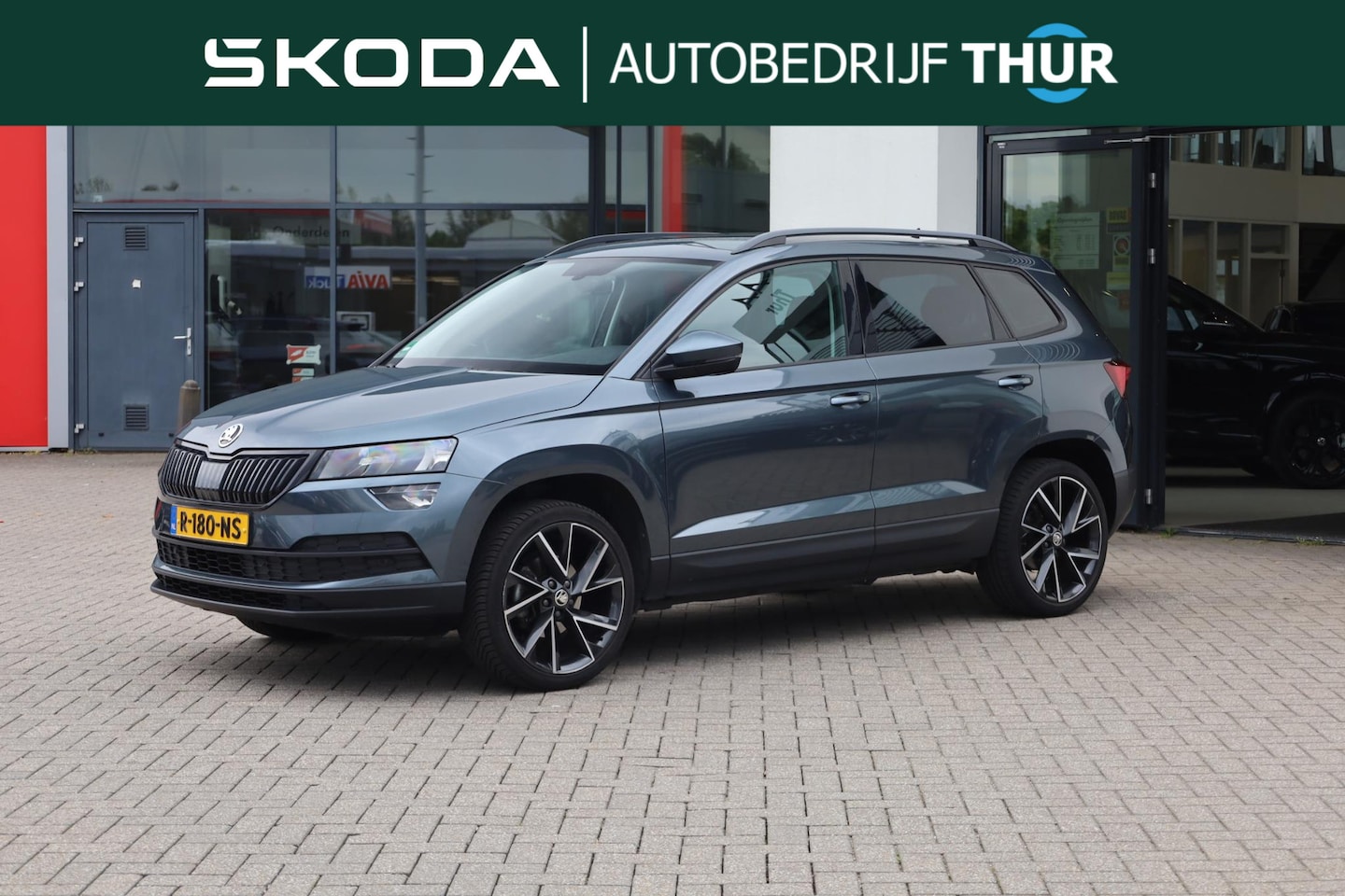 Skoda Karoq - 1.0 TSI Ambition Business achetruitrijcamera, privacy glas, 19''LMV, pdc voor en achter, n - AutoWereld.nl