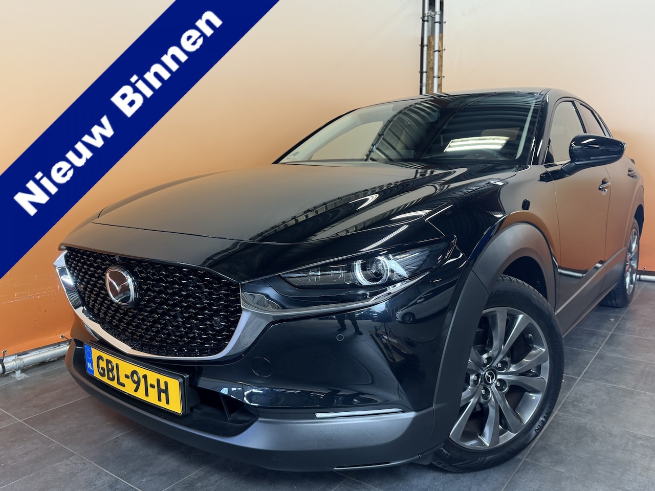 Mazda CX-30 - 2.0 e-SkyActiv-G M Hybrid Nagisa LEER | STOELVERW | STUURVERW | NAVI | CAMERA - AutoWereld.nl
