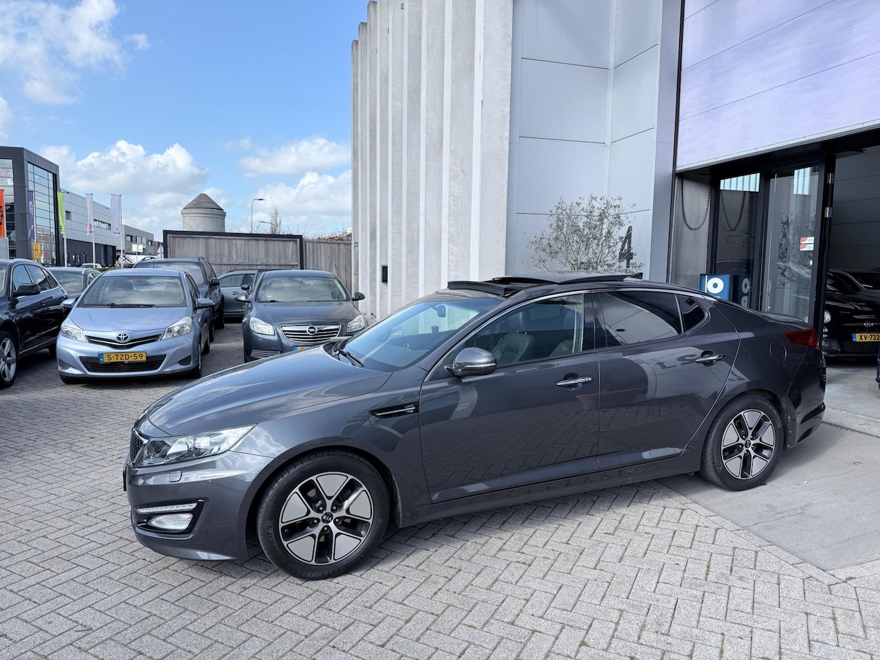 Kia Optima - 2.0 CVVT Hybrid Super Pack PANO! CAMERA! LEER! INRUIL MOGELIJK! - AutoWereld.nl