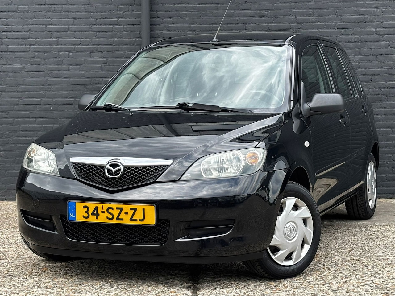 Mazda 2 - 1.4 Exclusive ELEK RAMEN | TREKHAAK | AIRCO | NWE APK - AutoWereld.nl