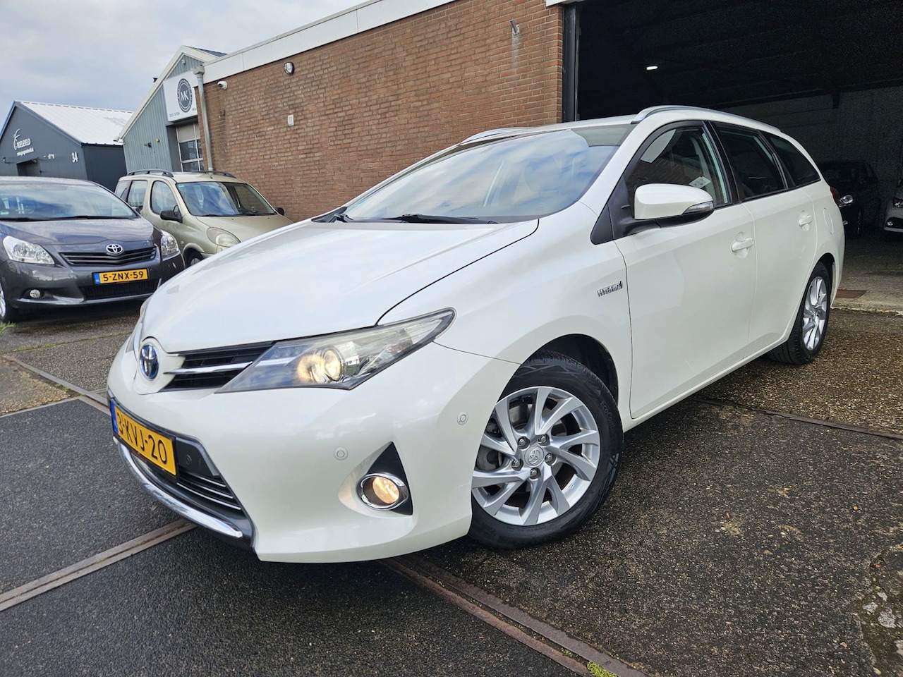 Toyota Auris Touring Sports - 1.8 Hybrid Executive GARANTIE - AutoWereld.nl