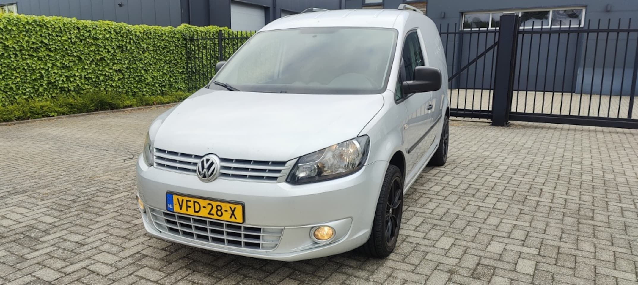 Volkswagen Caddy - 1.6 TDI Highline Automaat Navi Pdc - AutoWereld.nl