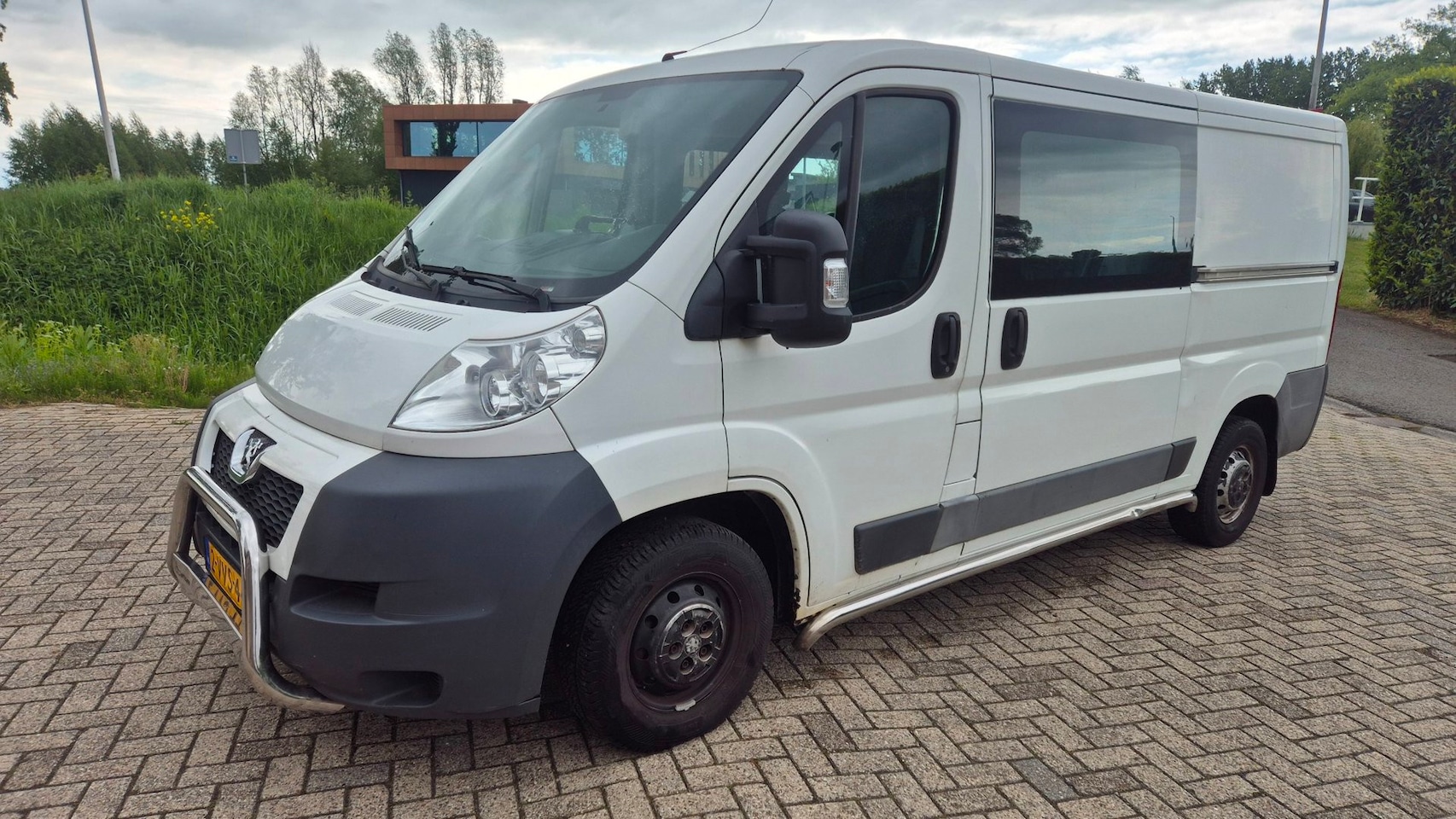 Peugeot Boxer - 330 2.2 HDI L2H2 DC Profit+ met luchtvering - AutoWereld.nl