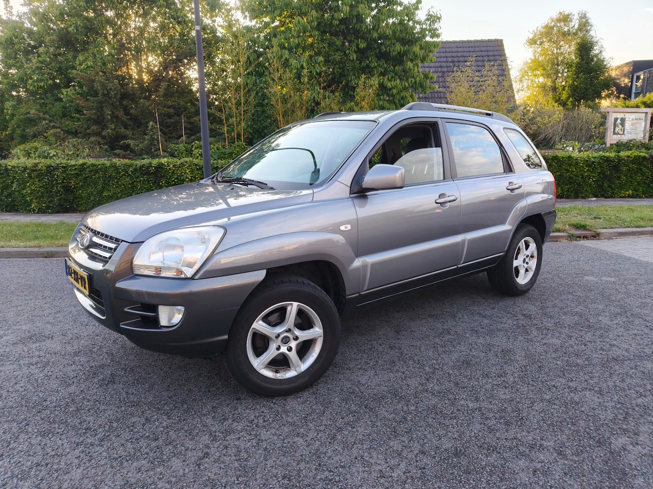 Kia Sportage - 2.0 CVVT Comfort Airco|Cruise|Winterset|APK - AutoWereld.nl