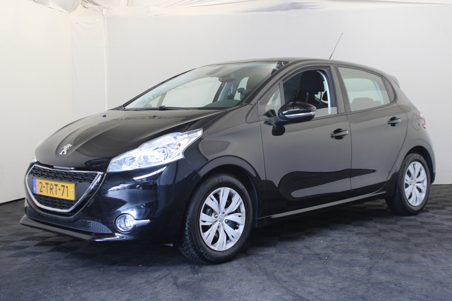 Peugeot 208 - 1.2 e-VTi Envy - AutoWereld.nl