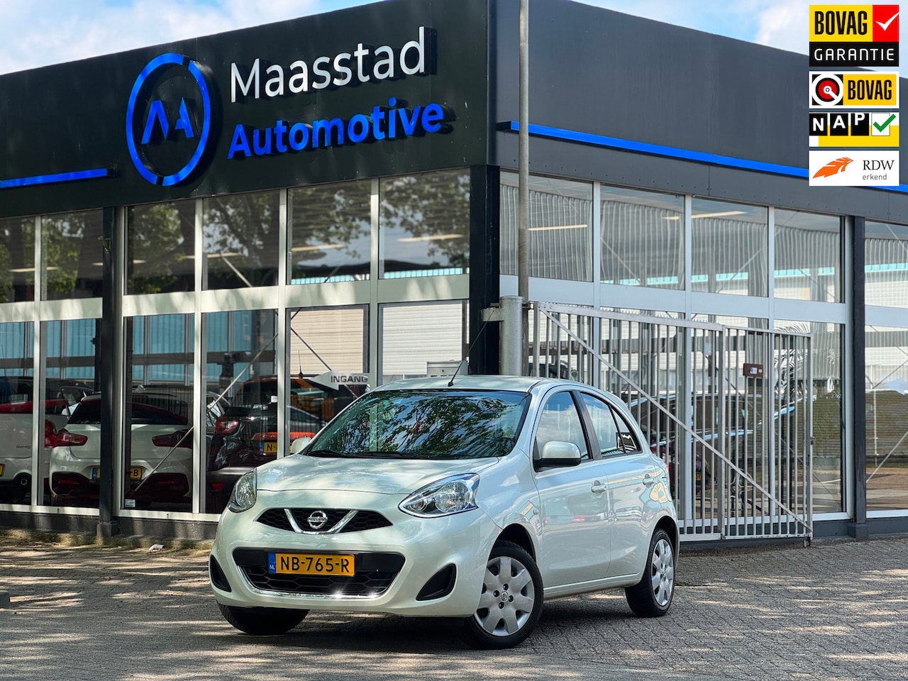 Nissan Micra - 1.2 Acenta 2e eig lage kms 5drs airco parelmoer lak - AutoWereld.nl