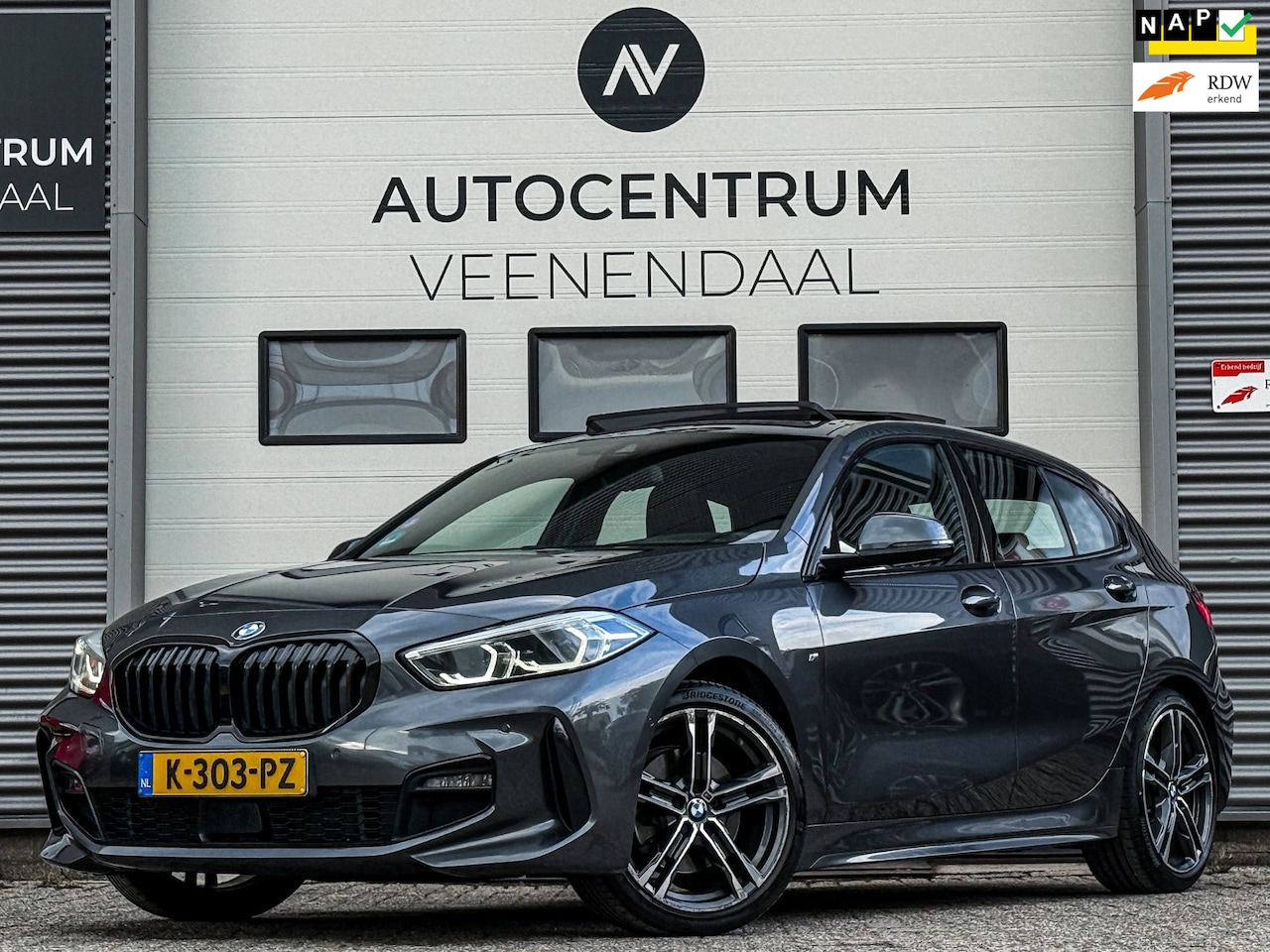 BMW 1-serie - 118i High Executive 3X M-SPORT PANO/H&K/SFEER/LEDER/NAP/NL AUTO - AutoWereld.nl
