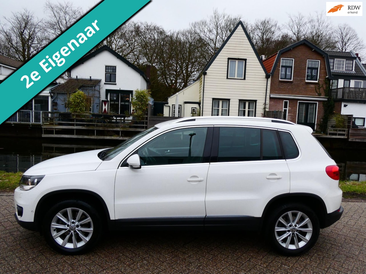 Volkswagen Tiguan - 1.4 TSI Sport&Style 161pk 2e eig. Clima Navi Trekhaak 1800kg - AutoWereld.nl