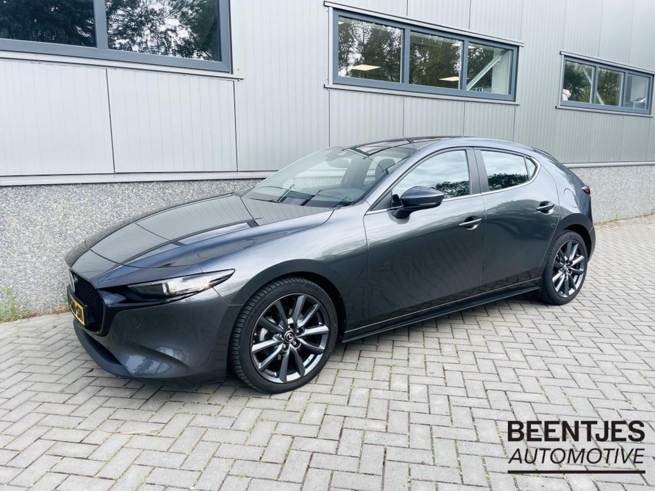 Mazda 3 - 2.0 e-SkyActiv-X M Hybrid 180 Comfort Bose | Camera | Stoelverw. | Memory seats | 18" - AutoWereld.nl