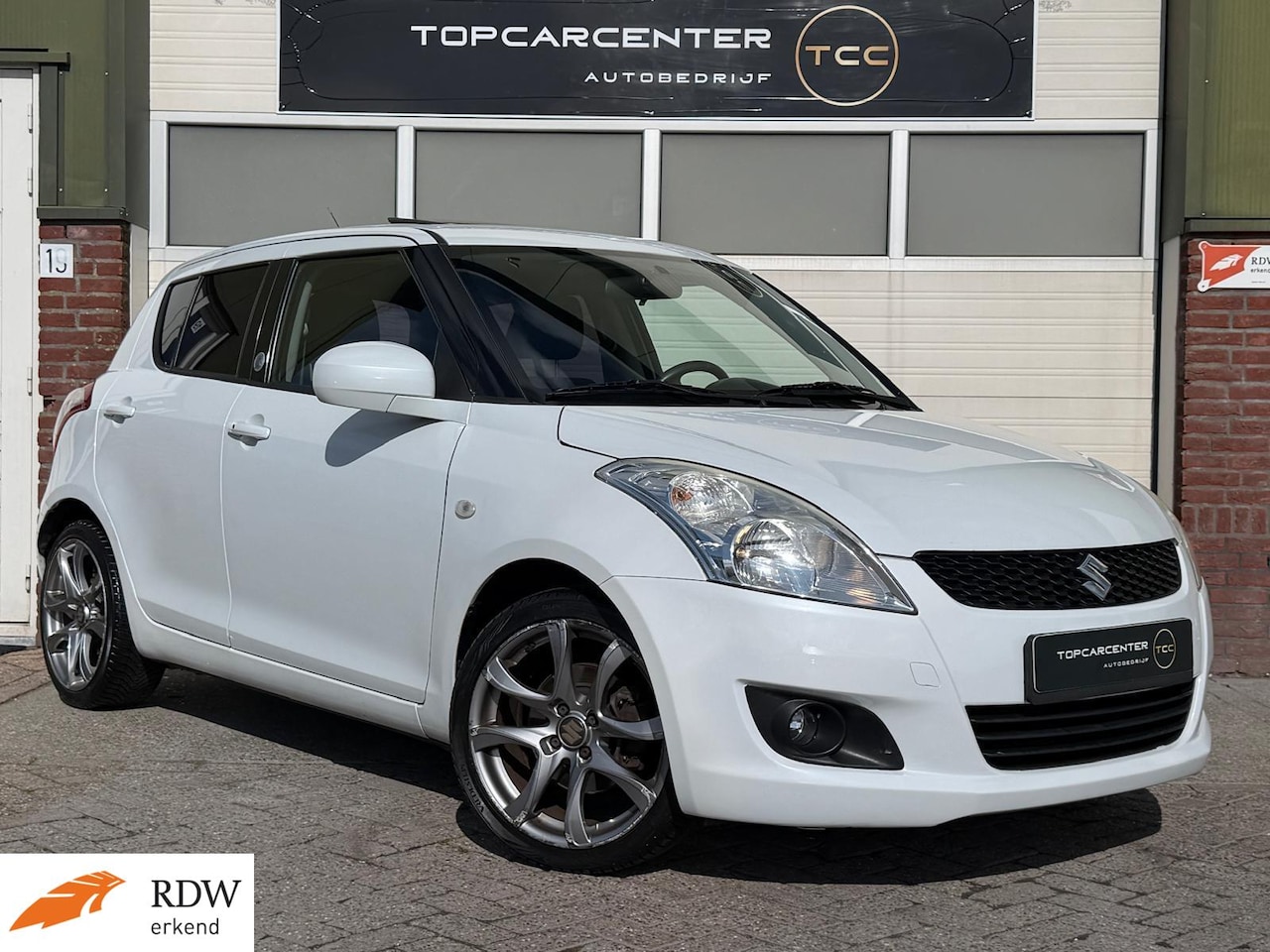 Suzuki Swift - 1.2 Exclusive/AIRCO/AUT/PARKS/NAVI/5DRS/APK - AutoWereld.nl