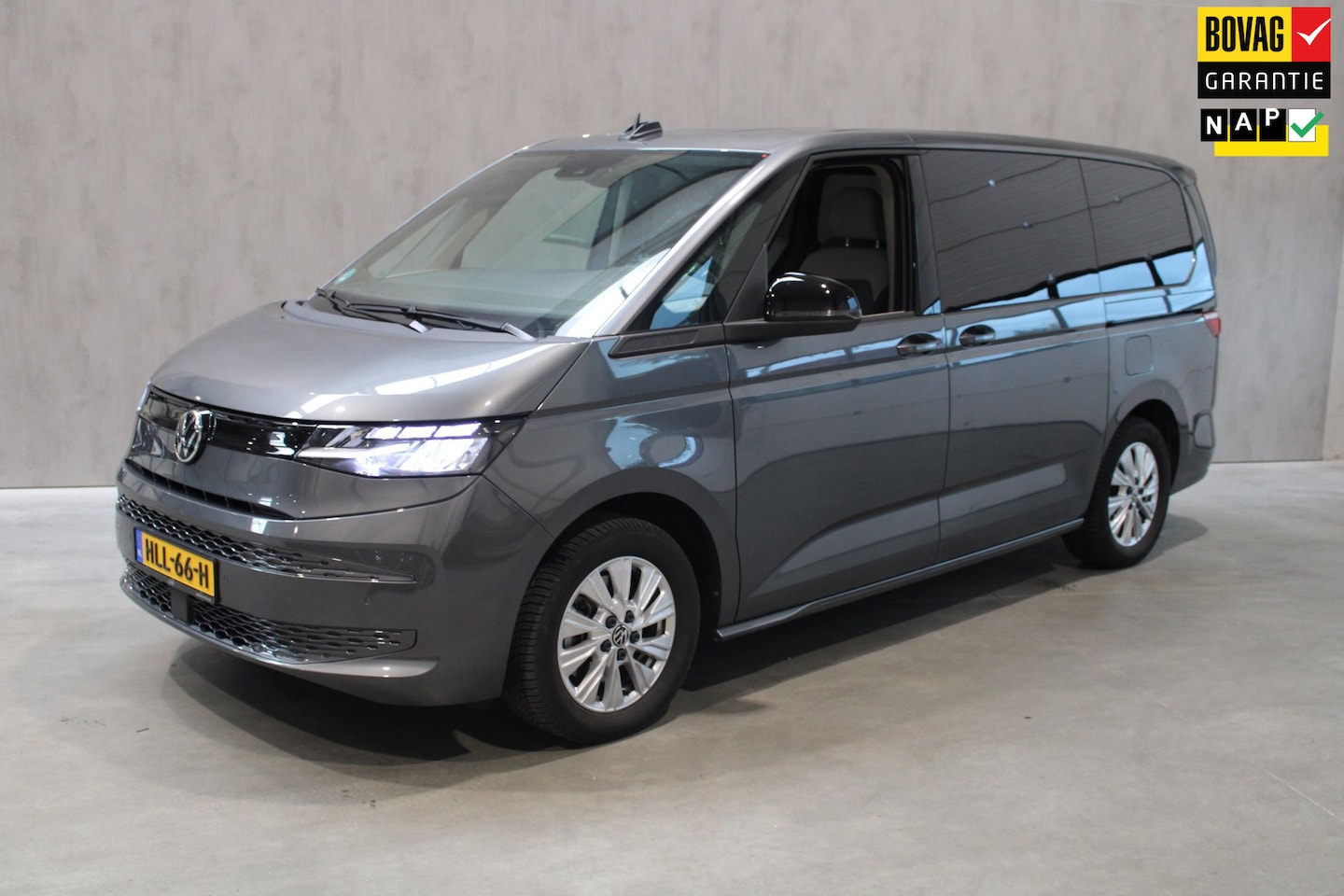 Volkswagen Multivan - 1.5 eHybrid L2 Business 4Motion Trekhaak/PDC/7 persoons prijs is rijklaar - AutoWereld.nl