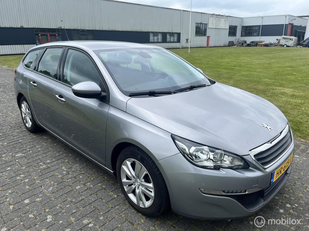 Peugeot 308 SW - 1.6 BlueHDI Blue Lease Executive / Navi / Cruise / APK / NAP / PDC / Trekhaak / - AutoWereld.nl