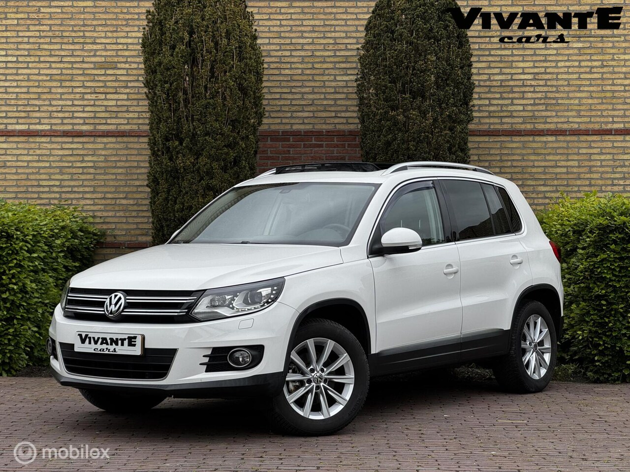 Volkswagen Tiguan - 2.0 TSI Sport&Style 4motion Pano*Leder*Camera - AutoWereld.nl