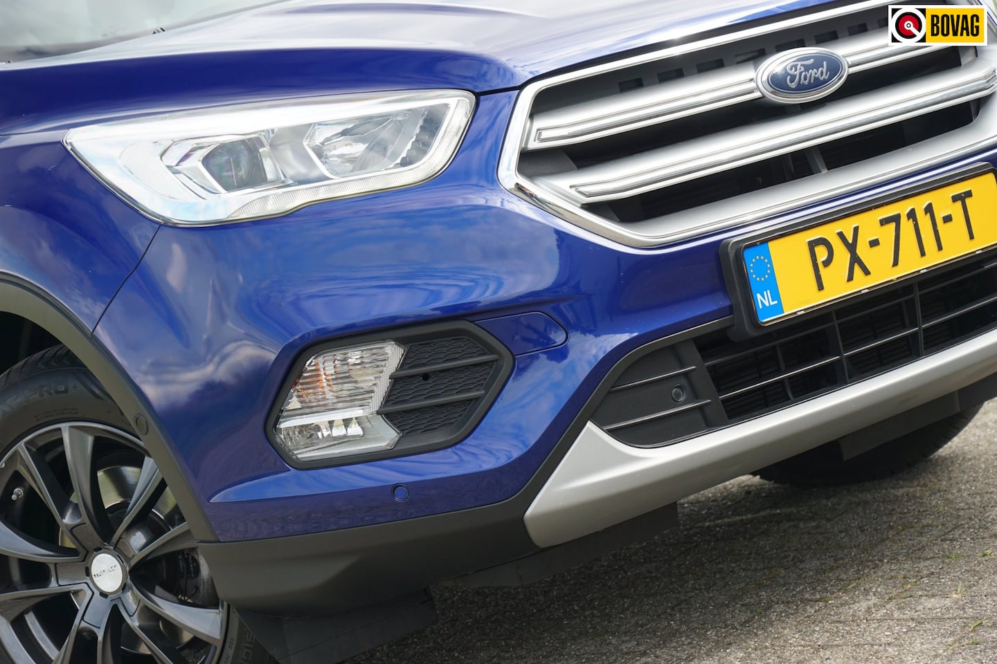 Ford Kuga - 1.5 EcoBoost Titanium | Deep Impact Blue | Nav/Cruise/Clima/Winterpack - 1800KG Trekgewich - AutoWereld.nl