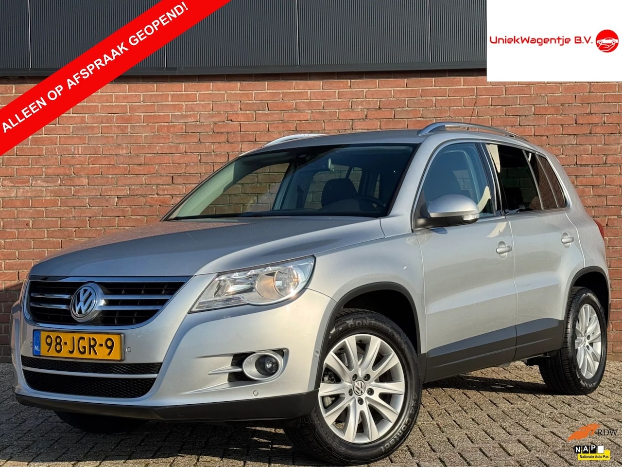 Volkswagen Tiguan - 2.0 TSI | NL-AUTO! | LEDER! | NAVI! - AutoWereld.nl