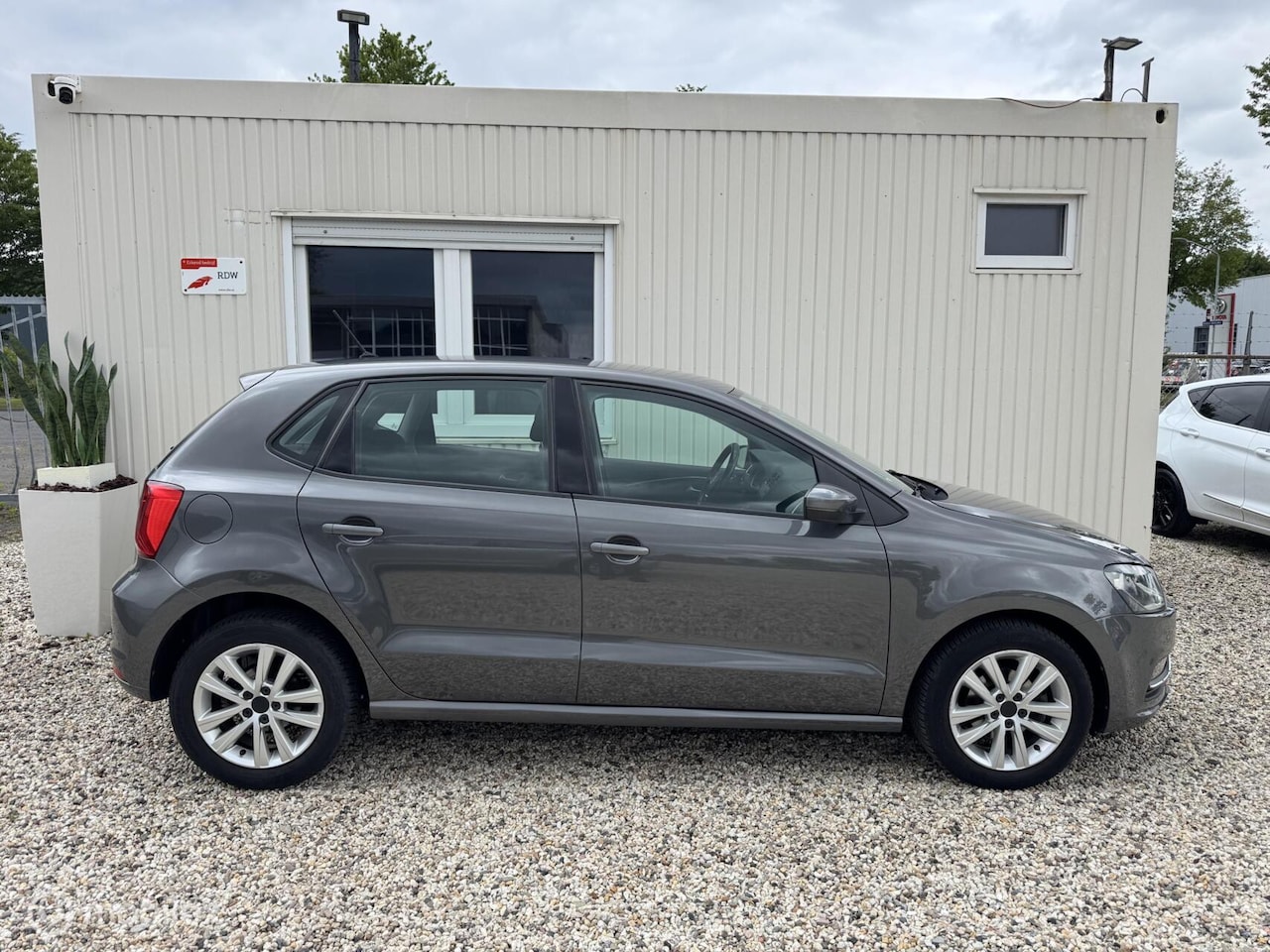 Volkswagen Polo - 1.2 TSI Highline Cruise Trekhaak Airco - AutoWereld.nl