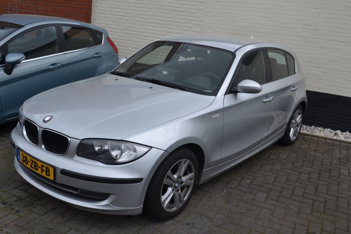 BMW 1-serie - 118i Business Line 5 drs Pracht Staat - AutoWereld.nl