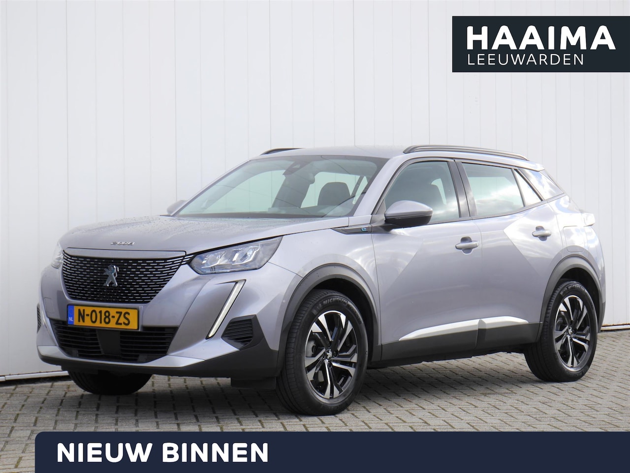 Peugeot e-2008 - EV Allure 50 kWh | Apple Carplay/Android Auto | 3D-Cockpit | 17-Inch Lichtmetalen Velgen | - AutoWereld.nl