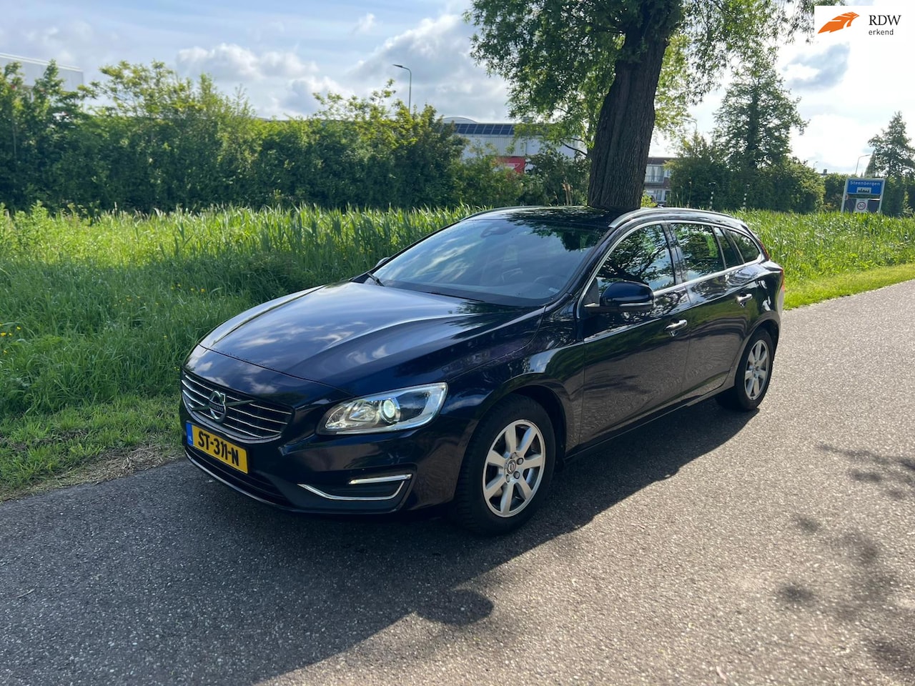 Volvo V60 - 2.0 T4 Kinetic 1e Eigenaar Airco Cruise Navi Pdc Achter Leder Bekleding - AutoWereld.nl