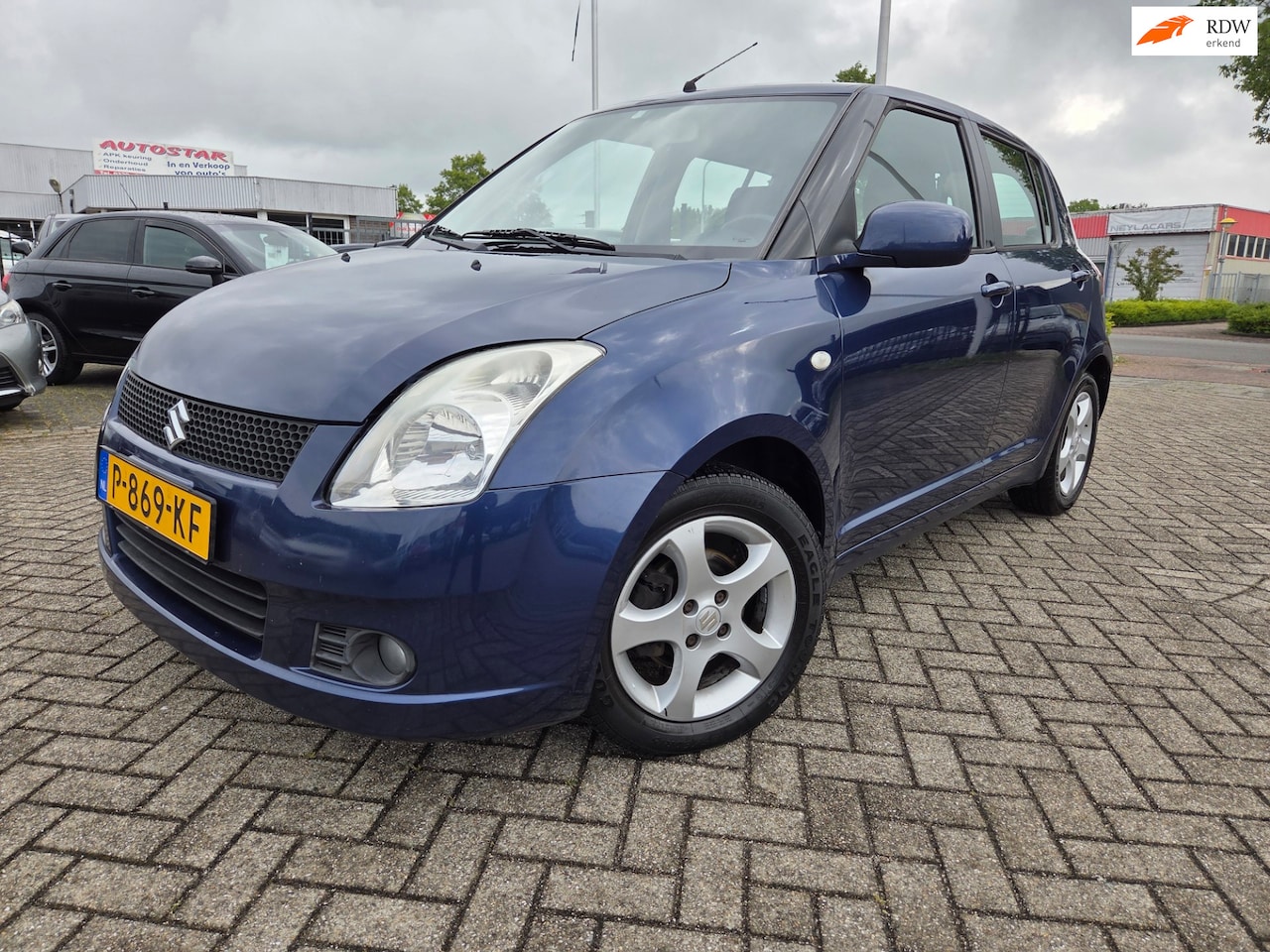 Suzuki Swift - 1.5 Comfort/STOELVERWARMING - AutoWereld.nl