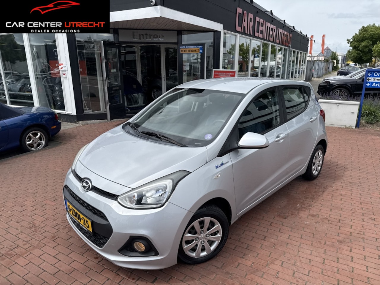 Hyundai i10 - 1.0i Go! navi airco cruise control hoge instap! - AutoWereld.nl