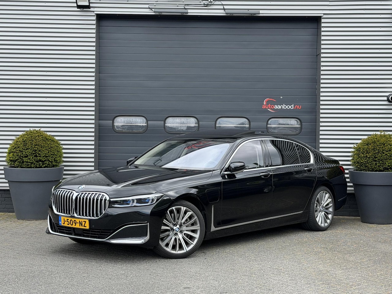 BMW 7-serie - 745Le xDrive High Executive | TV Schermen | Panoramadak | 360* Camera | Massage | Head-Up - AutoWereld.nl