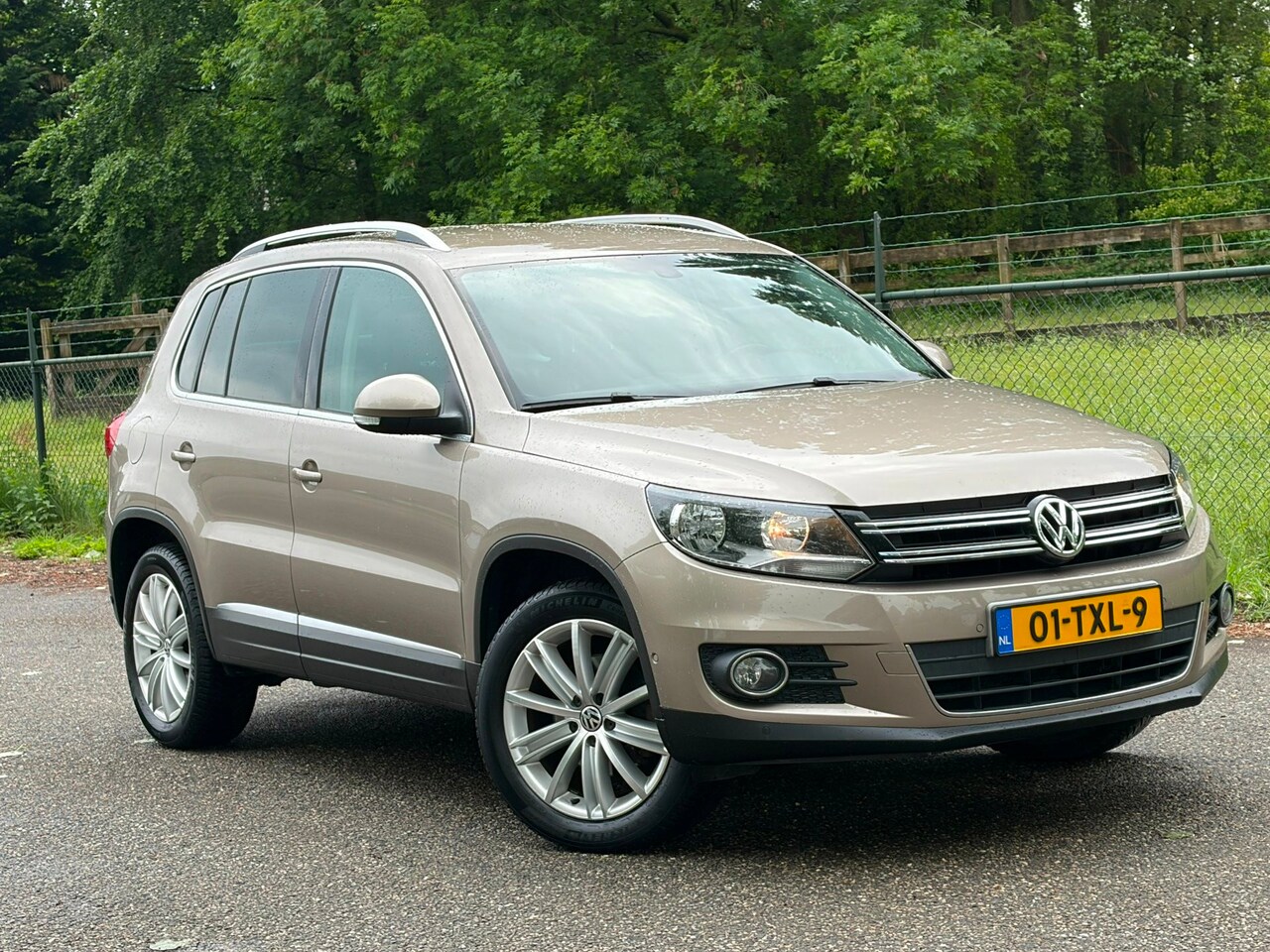 Volkswagen Tiguan - 2.0 TSI Sport&Style 4Motion /Automaat/Trekhaak/Navi/Stoelverwarming/ - AutoWereld.nl