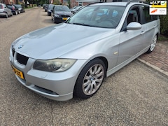 BMW 3-serie Touring - 320i High Executive differentieel hoorbaar