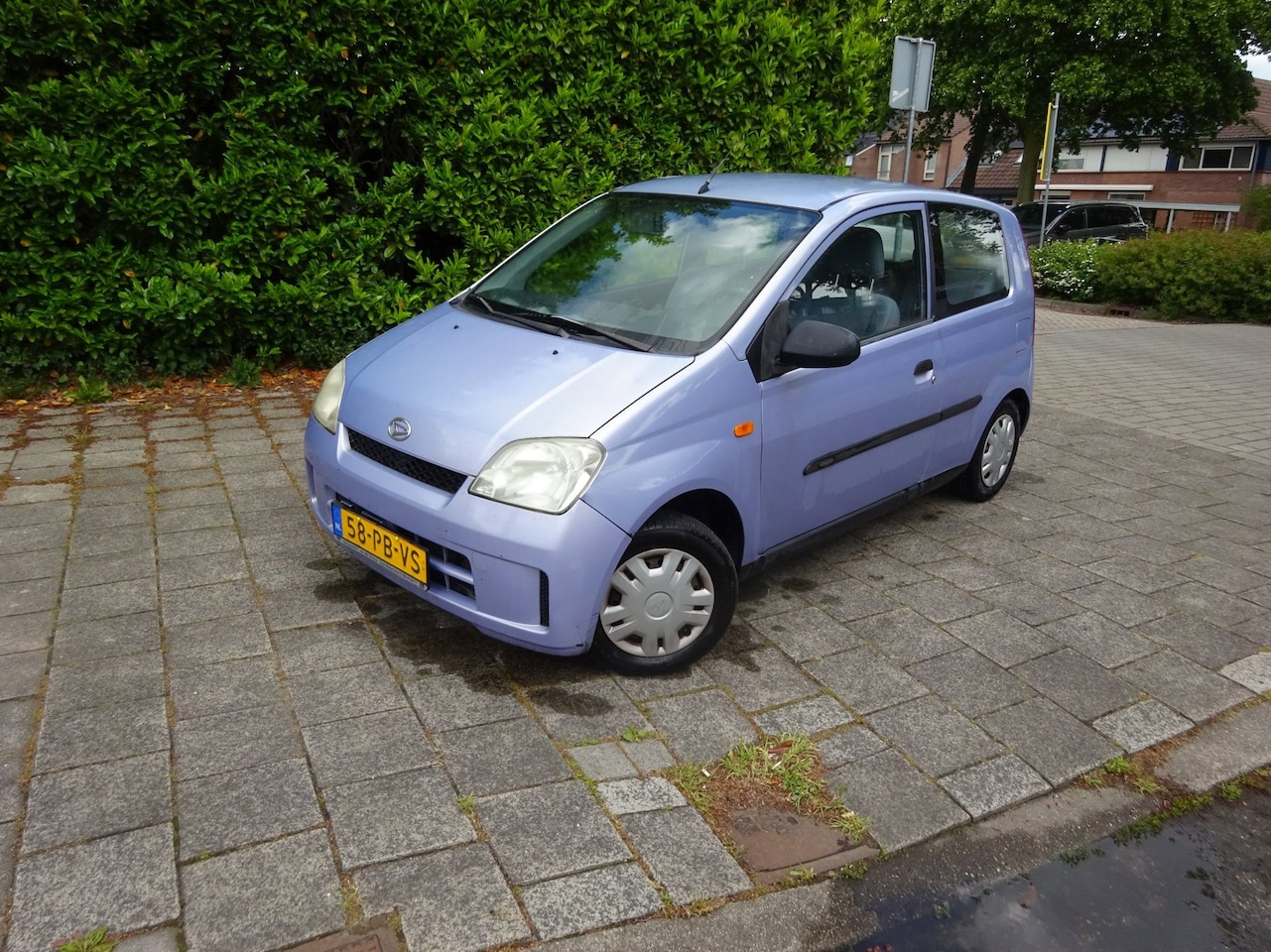 Daihatsu Cuore - 1.0-12V Tokyo MET APK - AutoWereld.nl