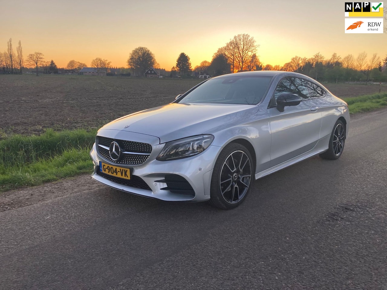 Mercedes-Benz C-klasse Coupé - 180 Premium Plus Pack 1e eig Panodak AMG Styling - AutoWereld.nl