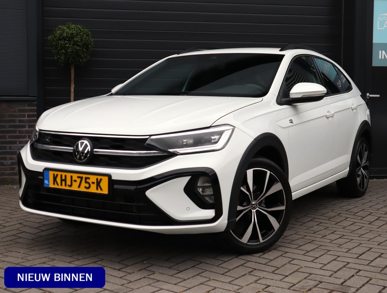 Volkswagen Taigo - 1.0 TSI R-Line Edition | IQ Light | 4 Jaar Fabrieksgarantie | Stoelverwarming | ACC | Came - AutoWereld.nl