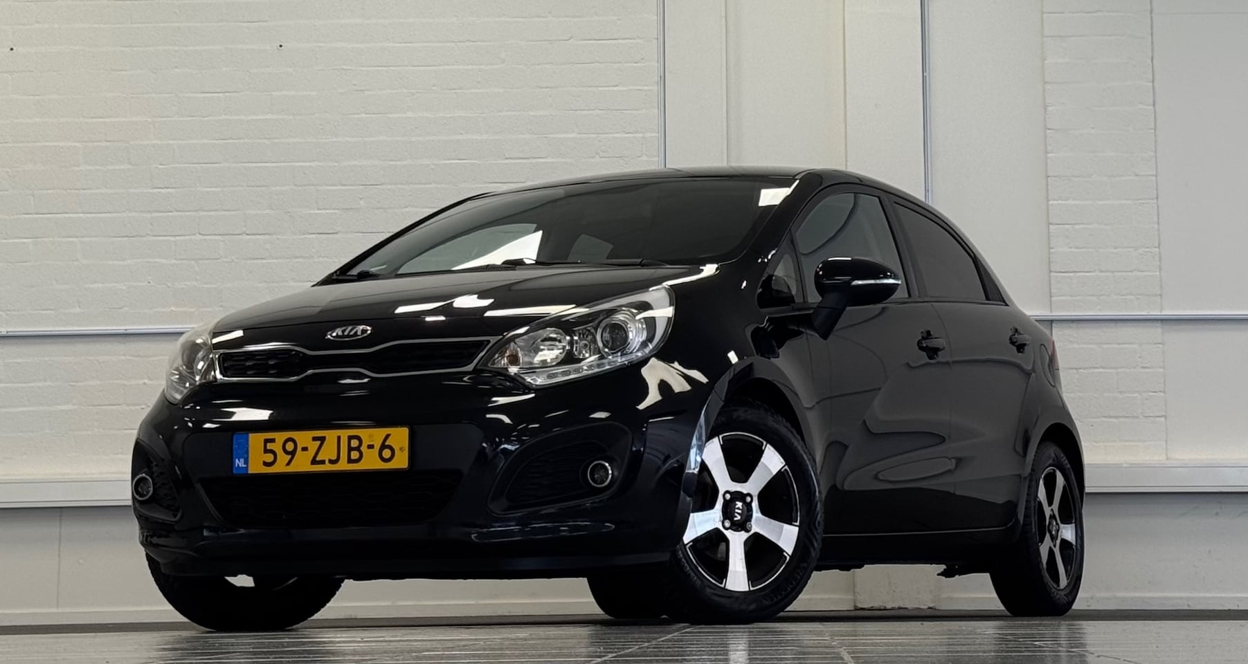 Kia Rio - 1.2 CVVT Design Edition 2e Eigenaar 100% onderhouden Clima - AutoWereld.nl