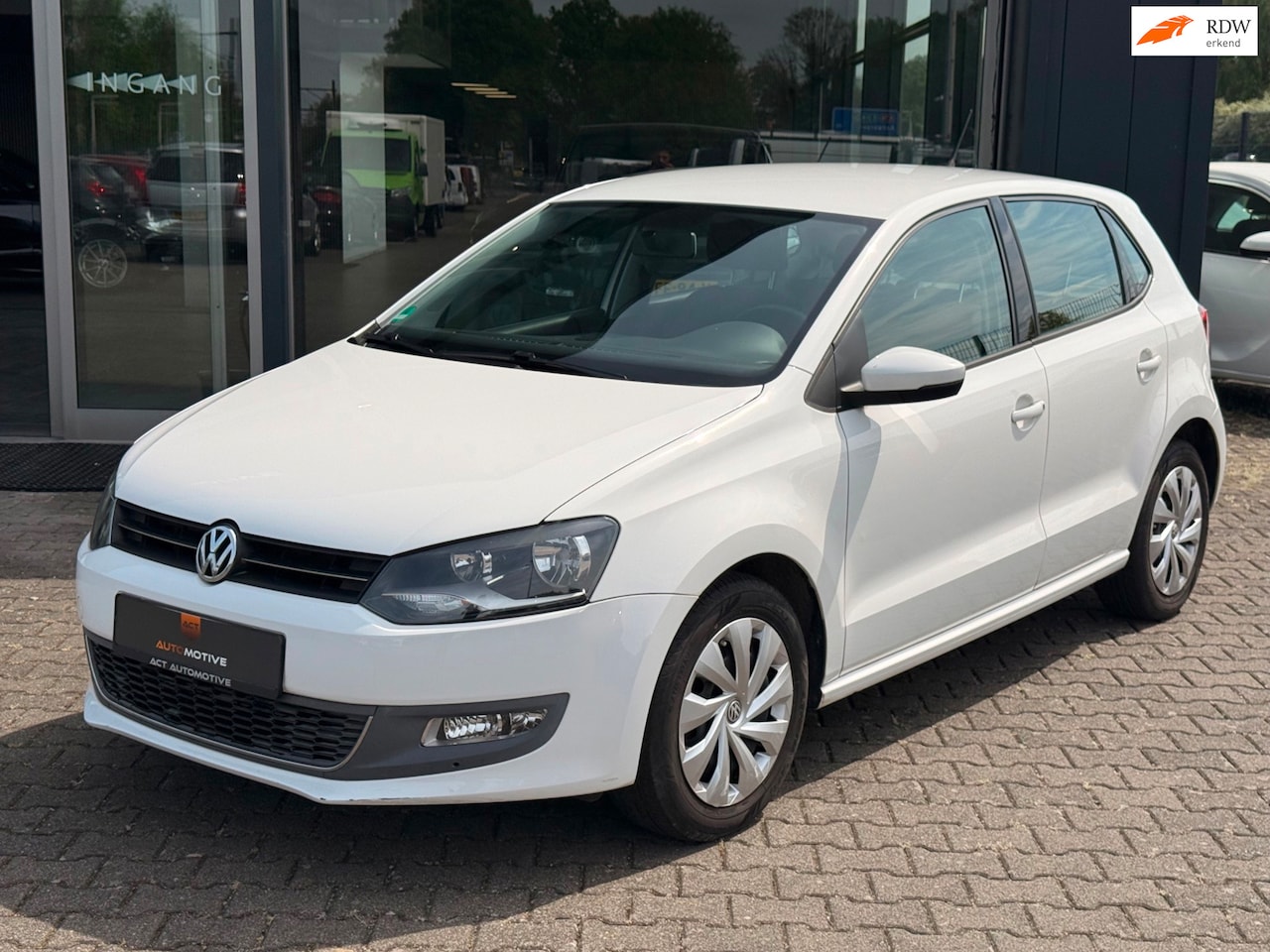 Volkswagen Polo - 1.2 TSI Comfortline Bluemotion Airco / Cruise - AutoWereld.nl