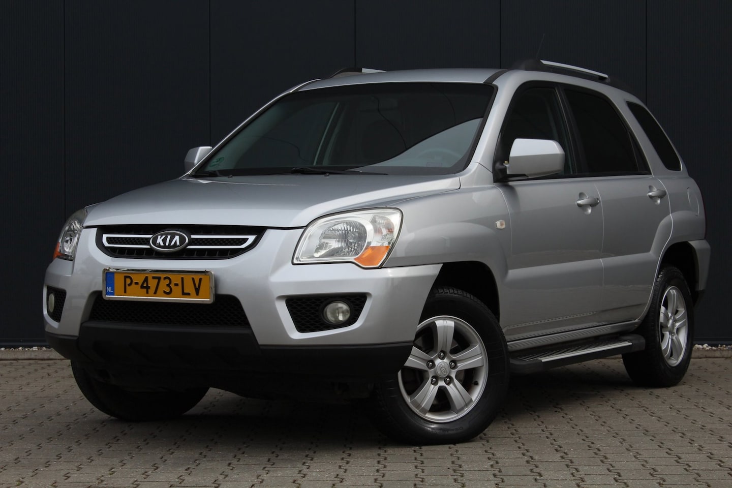 Kia Sportage - 2.0 CVVT X-clusive | Airco | Cruise control | Navigatie | APK | - AutoWereld.nl