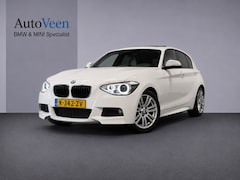BMW 1-serie - 118i High Executive (PANO, LED, STOELVERWARMING, GROOT NAVI, PARKEERSENSOREN)