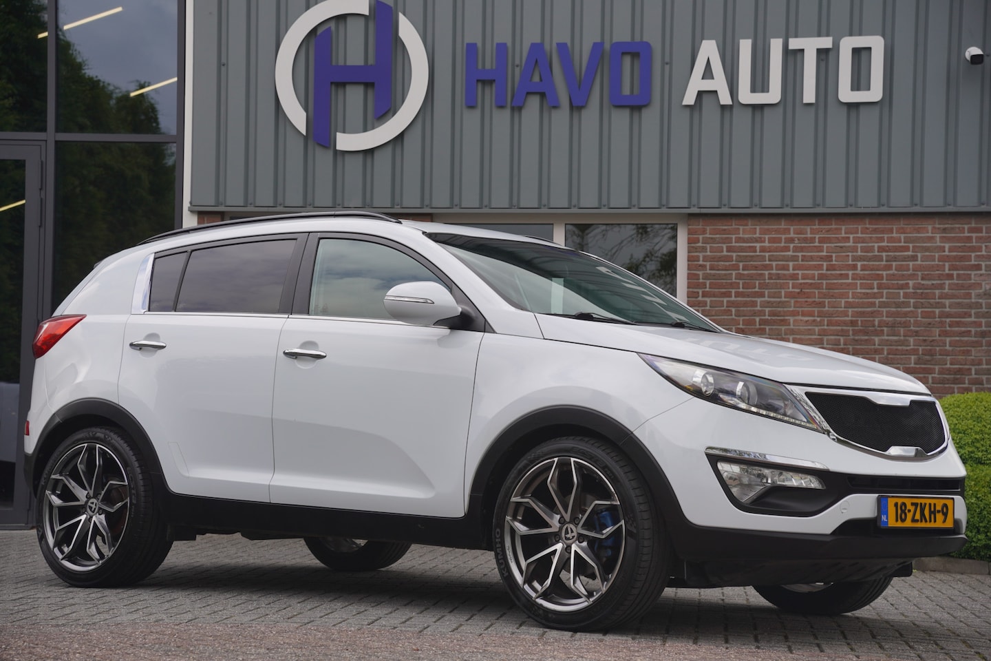 Kia Sportage - 1.6 GDI ISG X-tra 1.6 GDI ISG X-tra, AIRCO, TREKHAAK, NAP - AutoWereld.nl