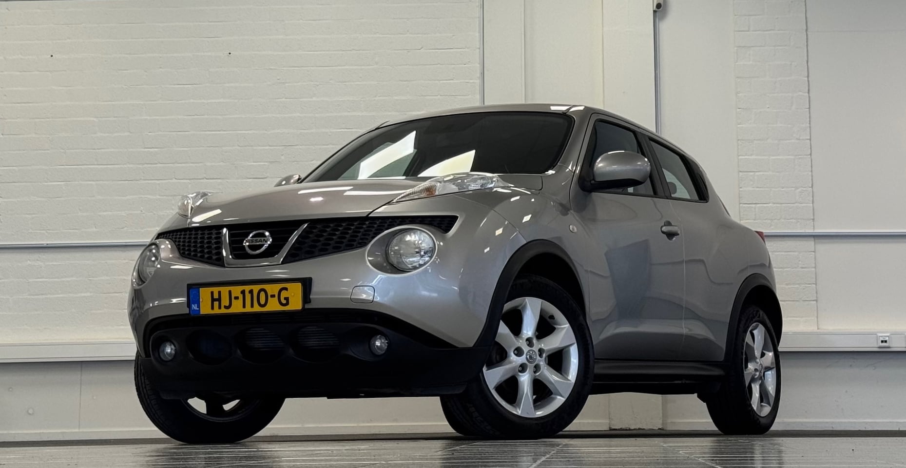 Nissan Juke - 1.6i 16V Acenta Clima Navigatie Mooi! - AutoWereld.nl
