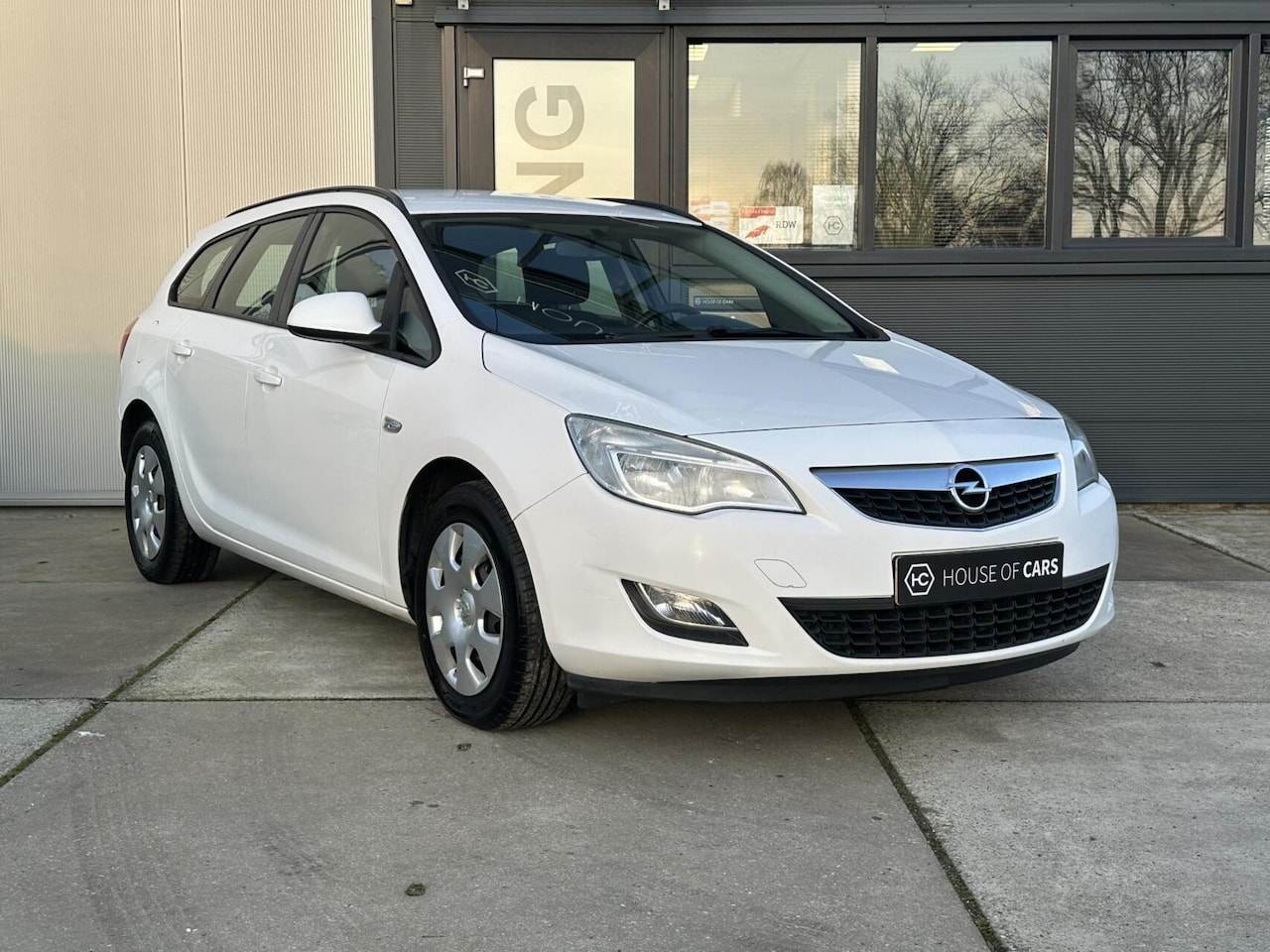Opel Astra Sports Tourer - 1.4 Edition Airco Cruise Navi NAP - AutoWereld.nl