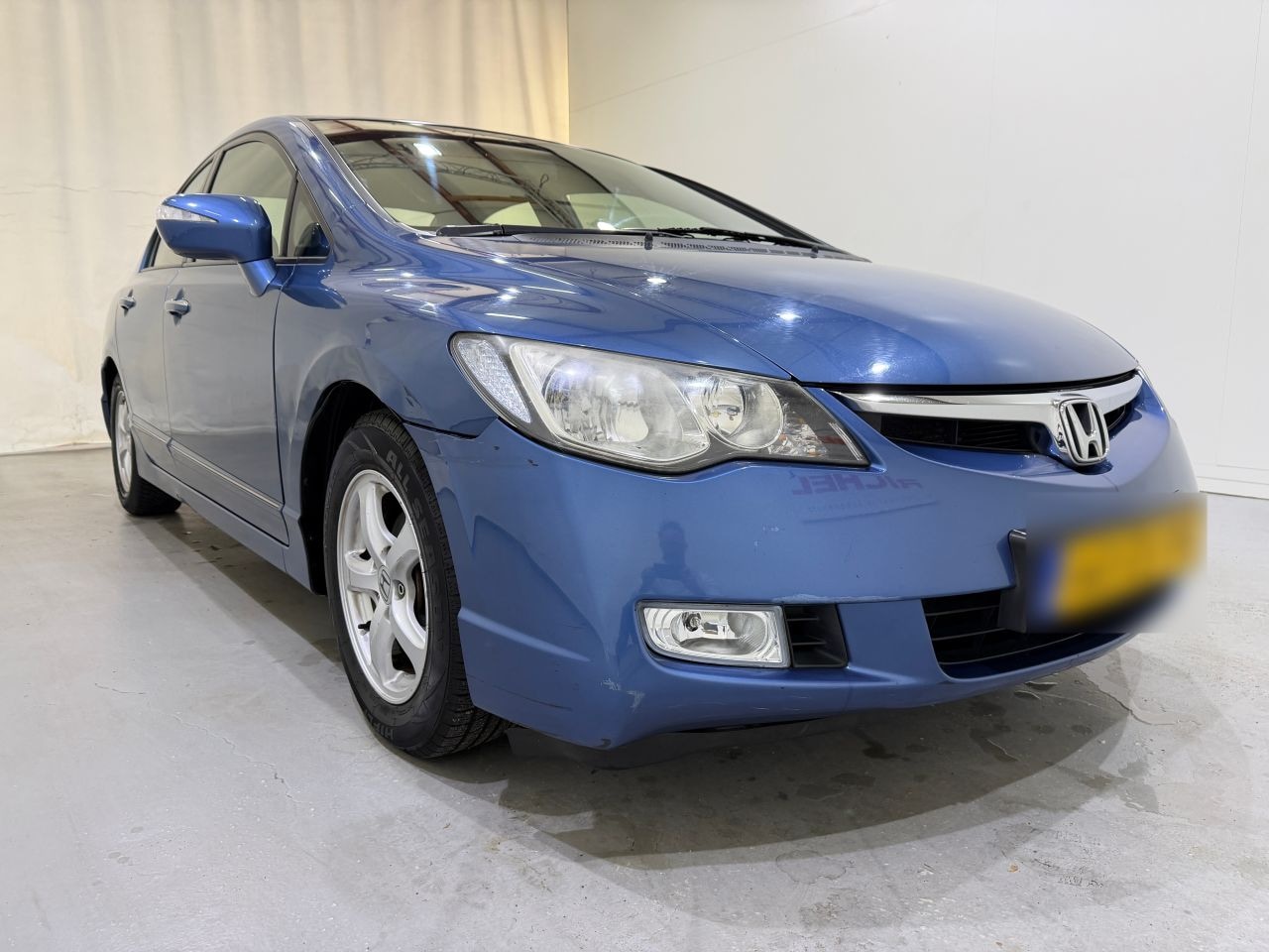 Honda Civic - 1.3i Hybrid Elegance Clima Aut. - AutoWereld.nl